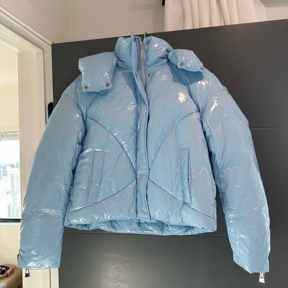 Glossy light blue puffer jacket from Naked Species! 🩵